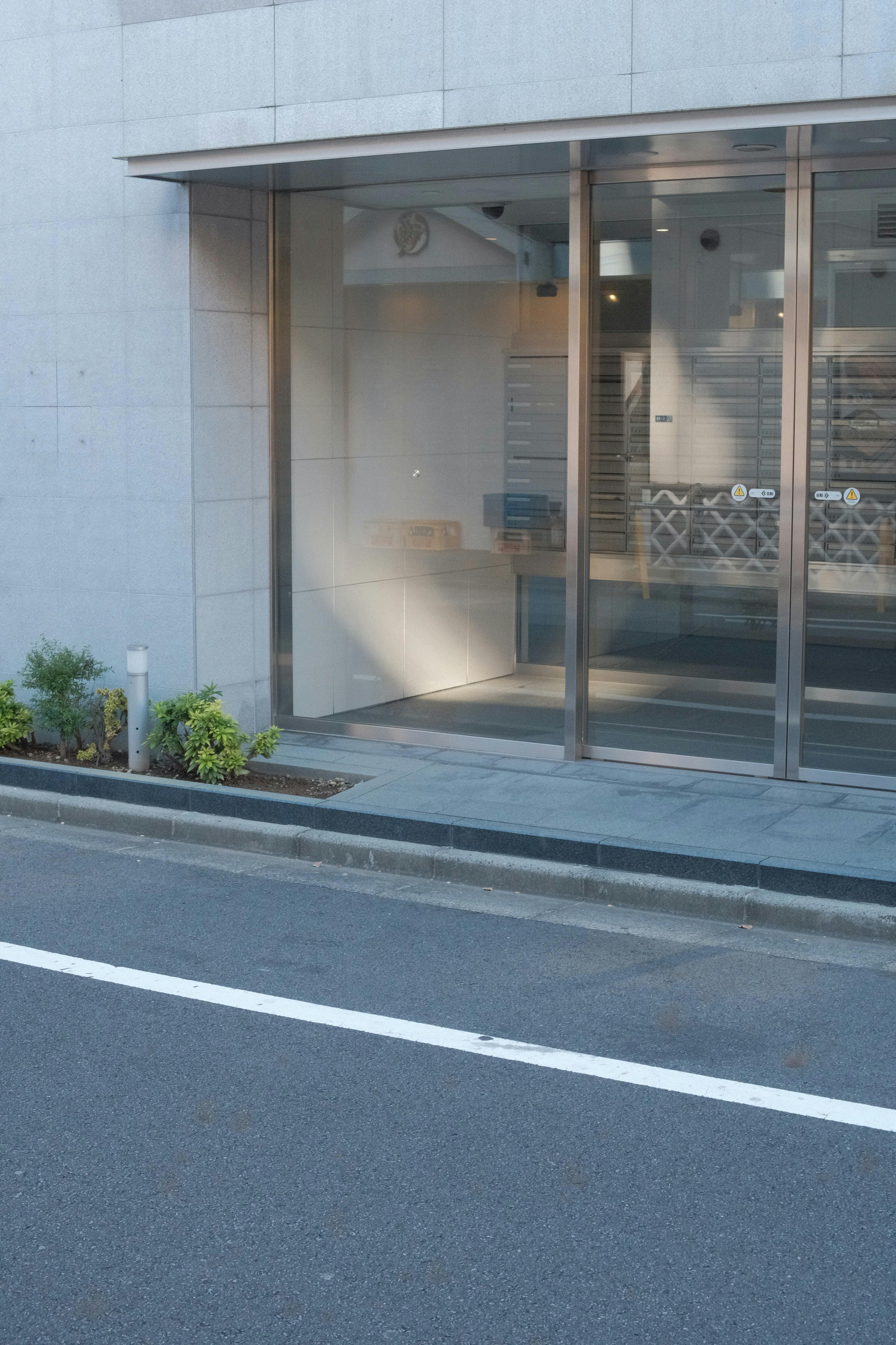 Automatische schuifdeur — glazen pui exterieur