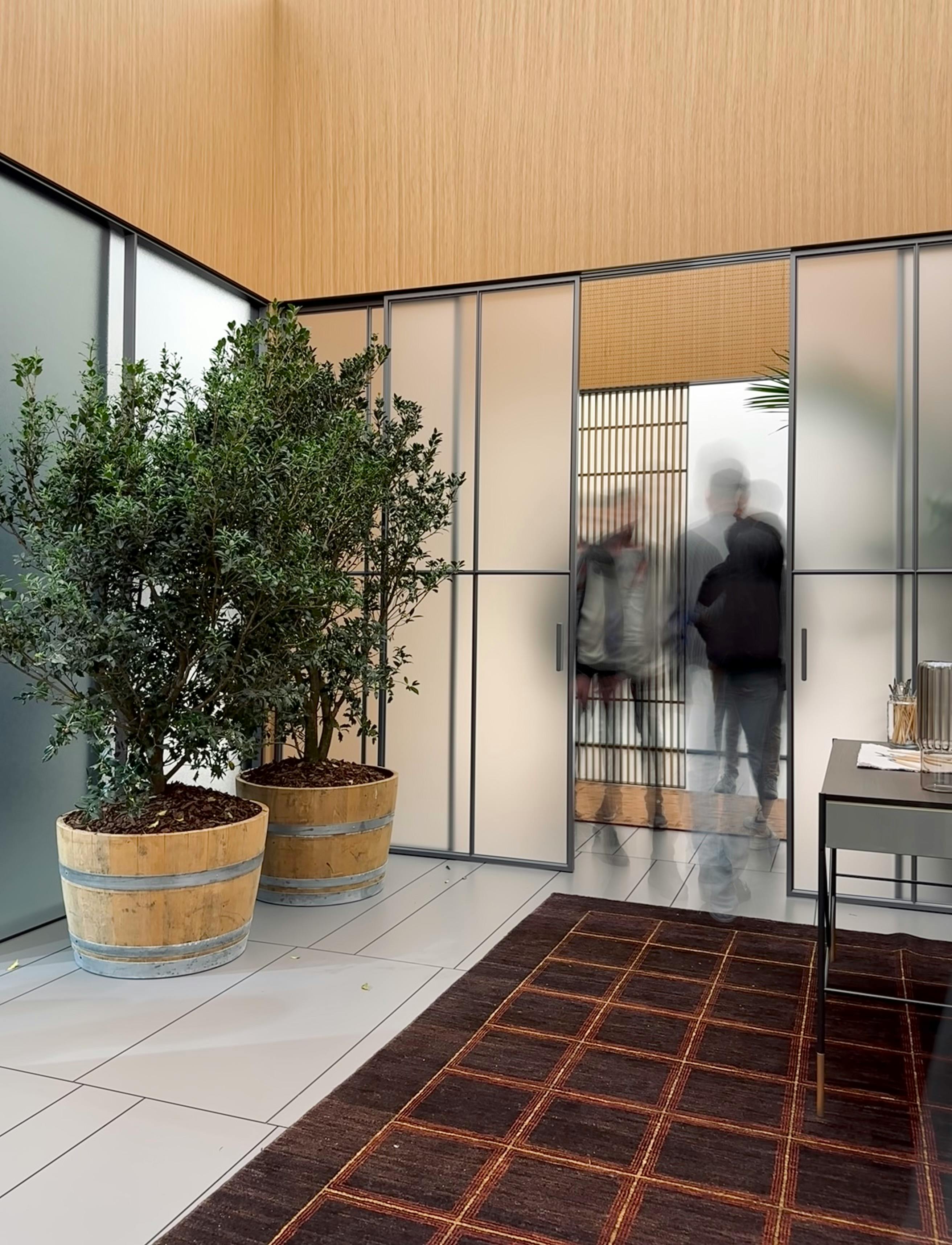 Moderne kantoorentree met automatische schuifdeuren